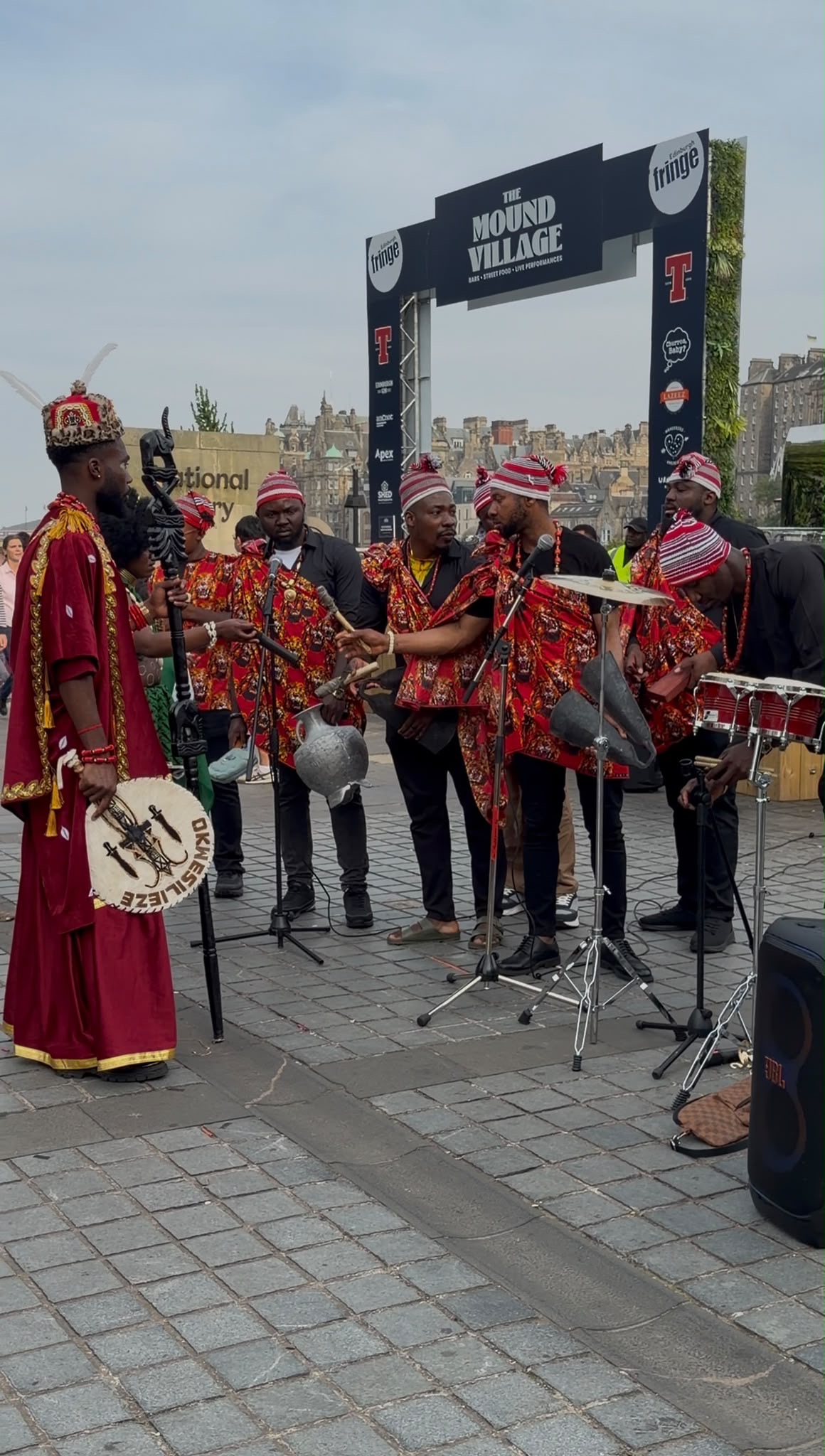 Chigozie Nwaodo alongside musicians at the Mound Village during the Edinburgh Fringe Festival. Photograph: Supplied