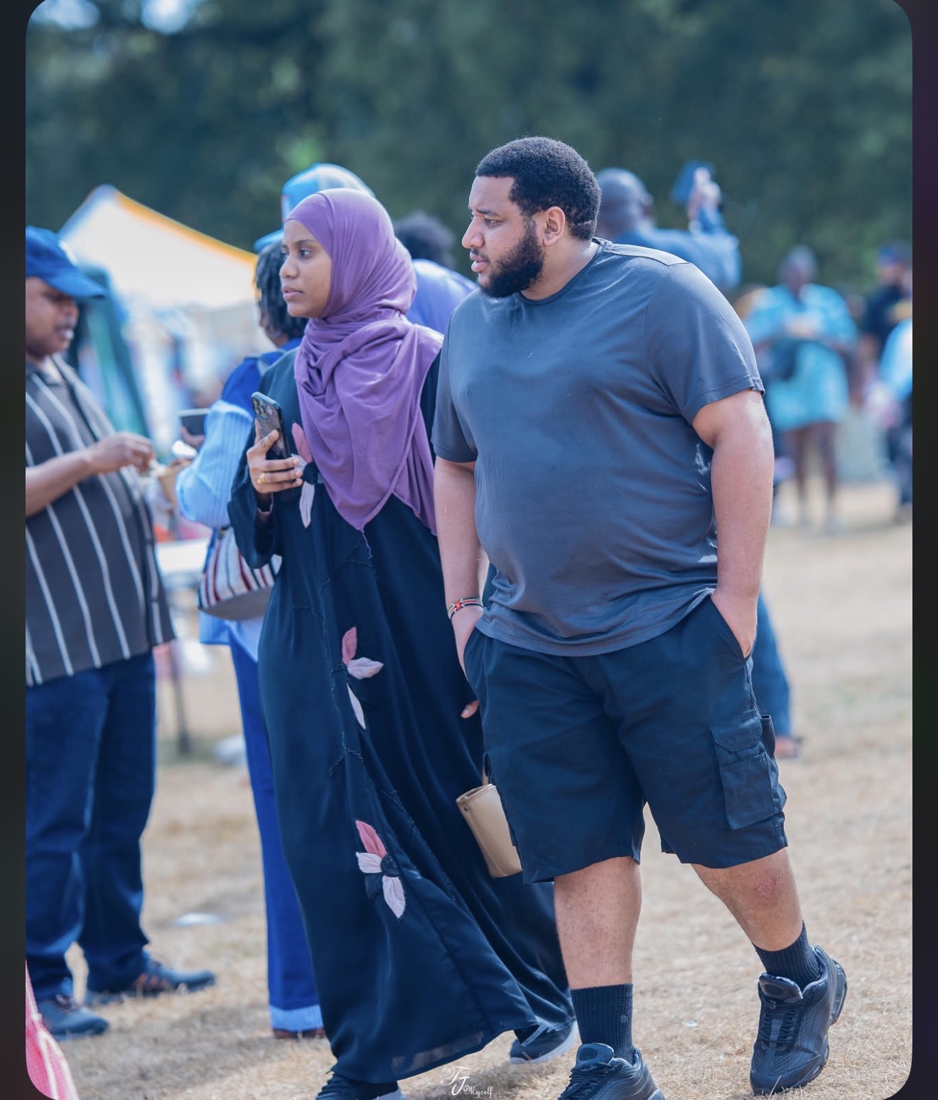 Festivalgoers explore the stalls and entertainment. Photograph: Joakraft Photography
