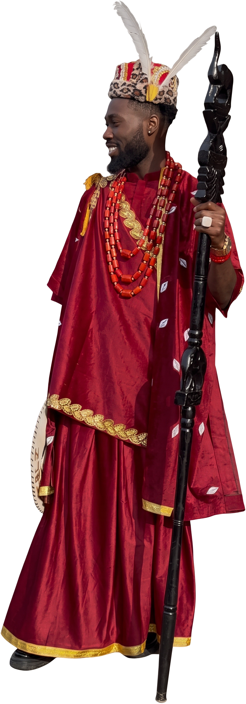 Chigozie Nwaodo’s red and gold regalia, feathered crown, coral beads and carved staff at the Edinburgh Fringe Festival. Photograph: Supplied; background removed